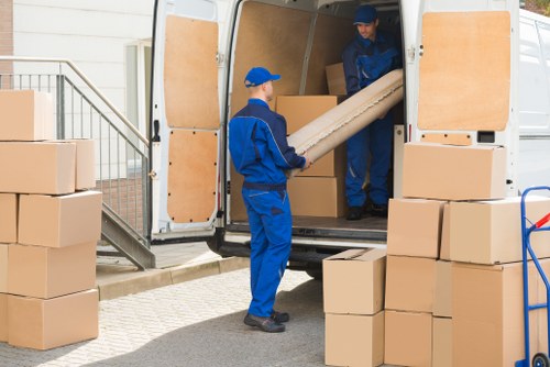 Removal team loading household goods for a France move