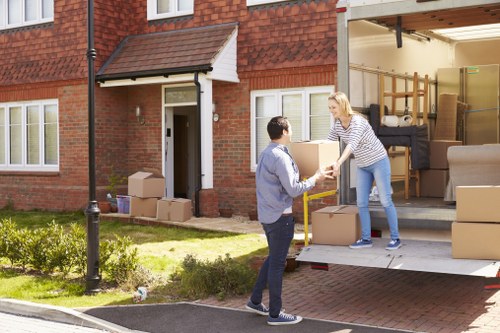 Moving boxes and furniture prepared for a France removals service