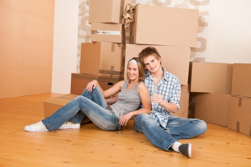 Removal van loading furniture for a move in a French city street