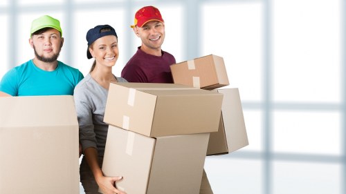 Office furniture and equipment being prepared for relocation in France