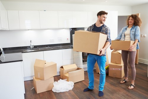 Packed household boxes and furniture prepared for transport in France