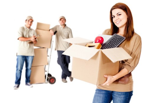 Team packing household items for a move in France