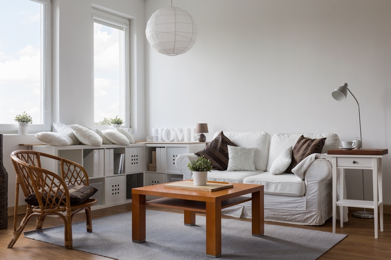 Team handling furniture delivery and unloading at a French property